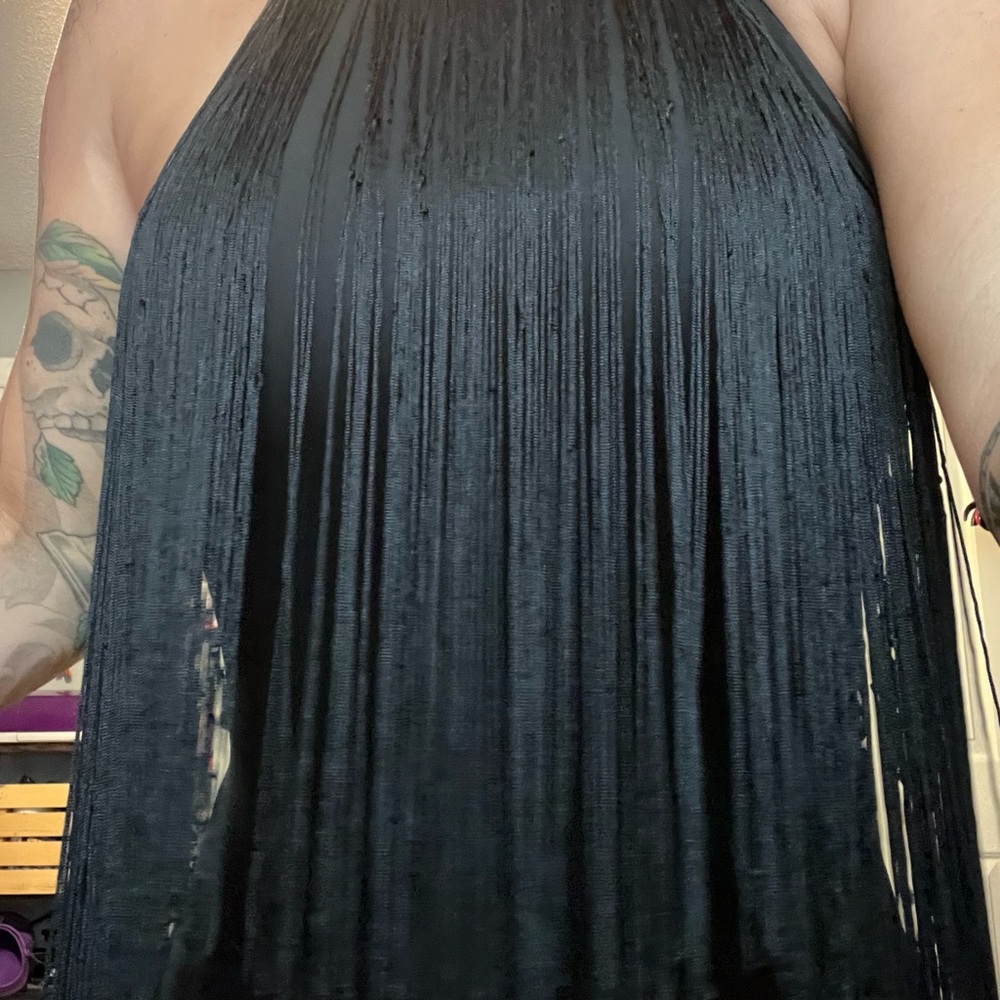 Black Fringe Halter Top snaps between the legs.